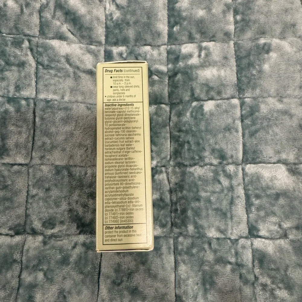 CLINIQUE  Moisture Surge Sheertint Hydrator Broad Spectrum SPF 25